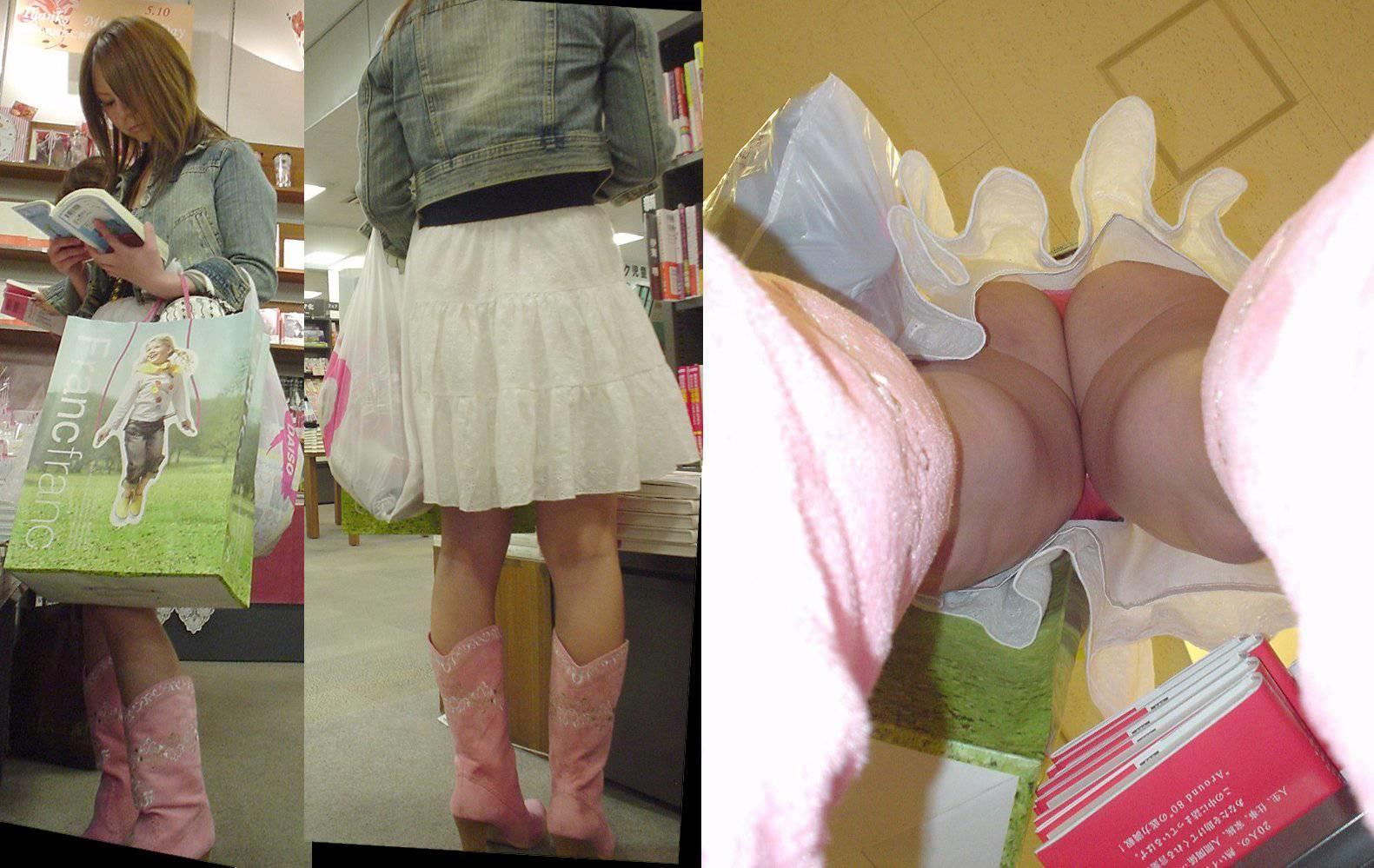 【逆さ撮り】ピンクTバックを穿いた素人娘のスカート内を接写撮りwの画像16枚目