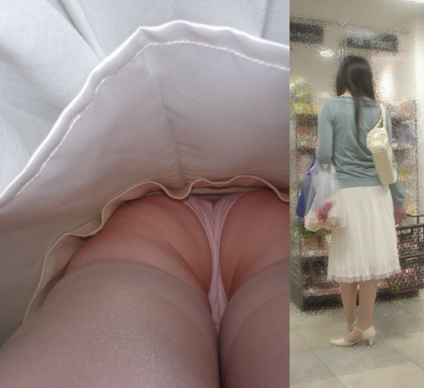 【逆さ撮り】ピンクTバックを穿いた素人娘のスカート内を接写撮りwの画像2枚目